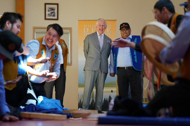 The Prince of Wales watches a display following a roundtable with Yellowknives Dene First Nation Leadership in Yellowknife