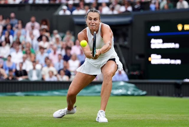 Aryna Sabalenka hits a backhand