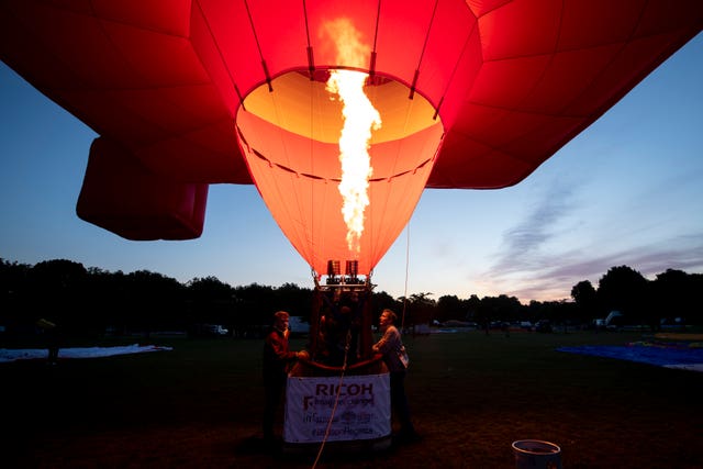 A hot air balloon prepares to take off from Battersea Park