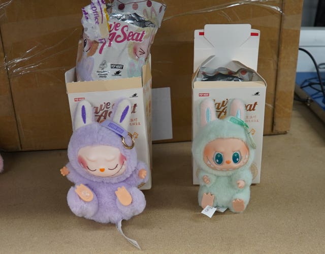 Undated handout photo issued by the Home Office of a fake Labubu toy (left), which has been seized by Border Force