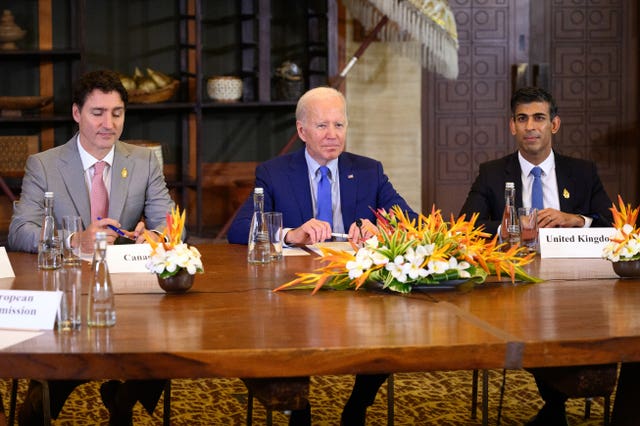 Rishi Sunak with Canadian Prime Minister Justin Trudeau and US President Joe Biden at an emergency meeting of Western leaders during the G20 summit