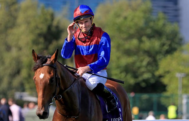 Ryan Moore with Luxembourg after victory in the Irish Champion Stakes