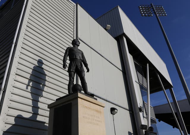 A statue of George Cohen stands outside Fulham's Craven Cottage ground