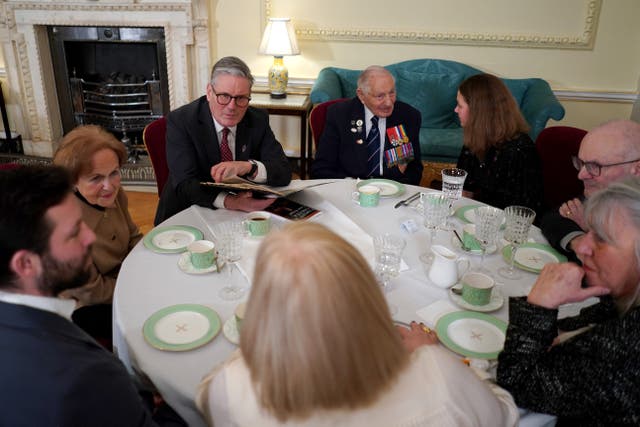 Prime Minister Sir Keir Starmer, third left, speaking to guests during a reception to mark Holocaust Memorial Day at 10 Downing Street