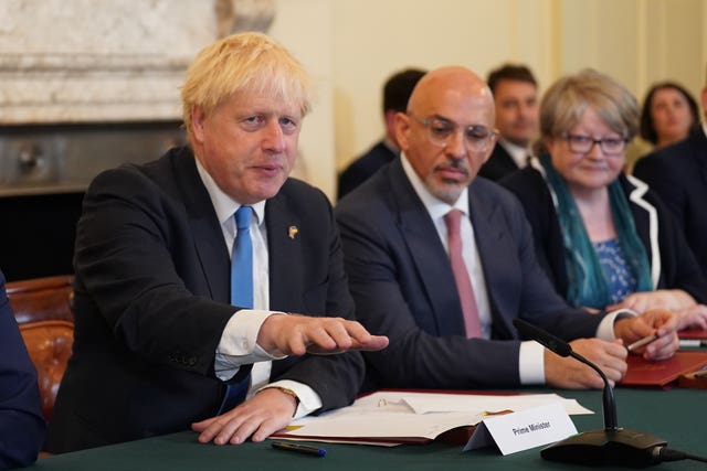 Boris Johnson sat to the left of hancellor of the Exchequer Nadhim Zahawi