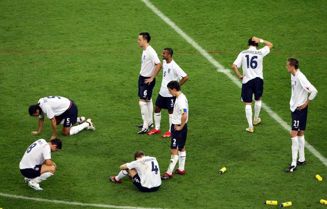 England players look dejected after a Cristiano Ronaldo penalty put them out of the 2006 World Cup