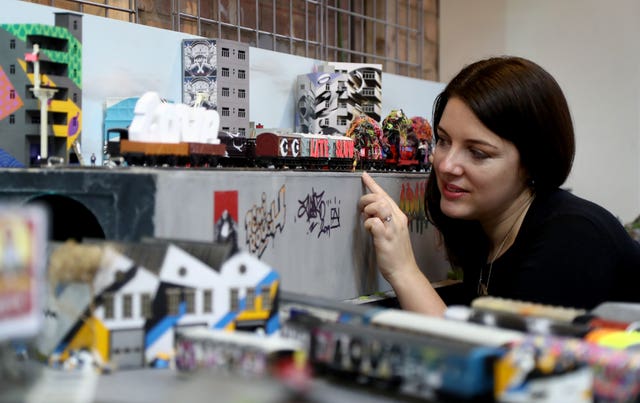 Emily Paxton works on her exhibition