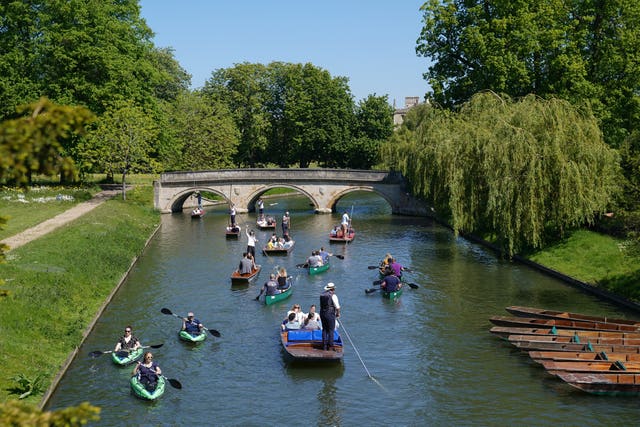 Punts and kayaks on the River Cam in Cambridge