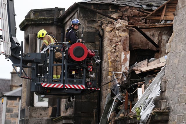 Fire investigators at the scene of the explosion