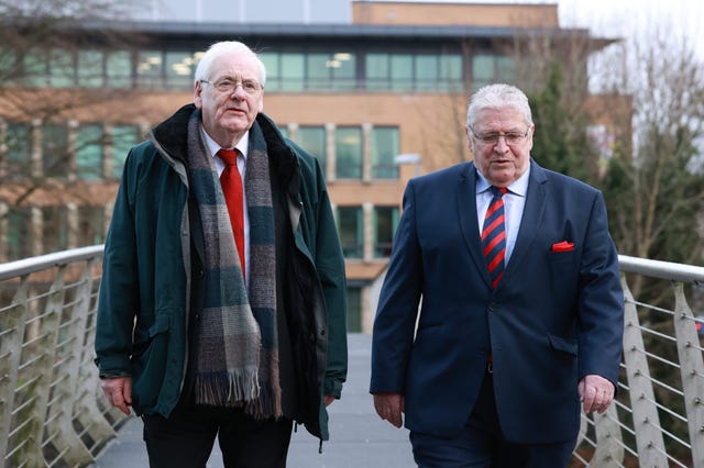 Michael Gallagher, the father of Aiden Gallagher, with Stanley McCombe, the husband of Ann McCombe