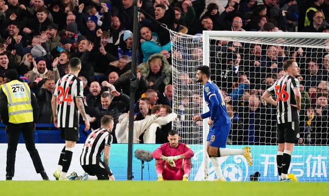 Newcastle''s Kieran Trippier, centre left, and Martin Dubravka are left dejected on the ground after Chelsea’s equaliser