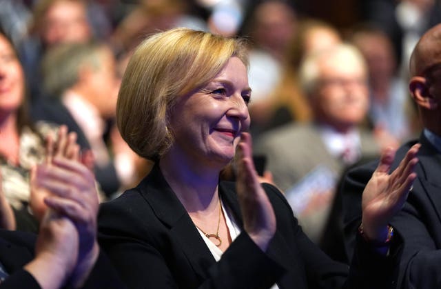 Prime Minister Liz Truss applauding Chancellor of the Exchequer Kwasi Kwarteng during the Conservative Party annual conference at the International Convention Centre in Birmingham on Monday October 3, 2022