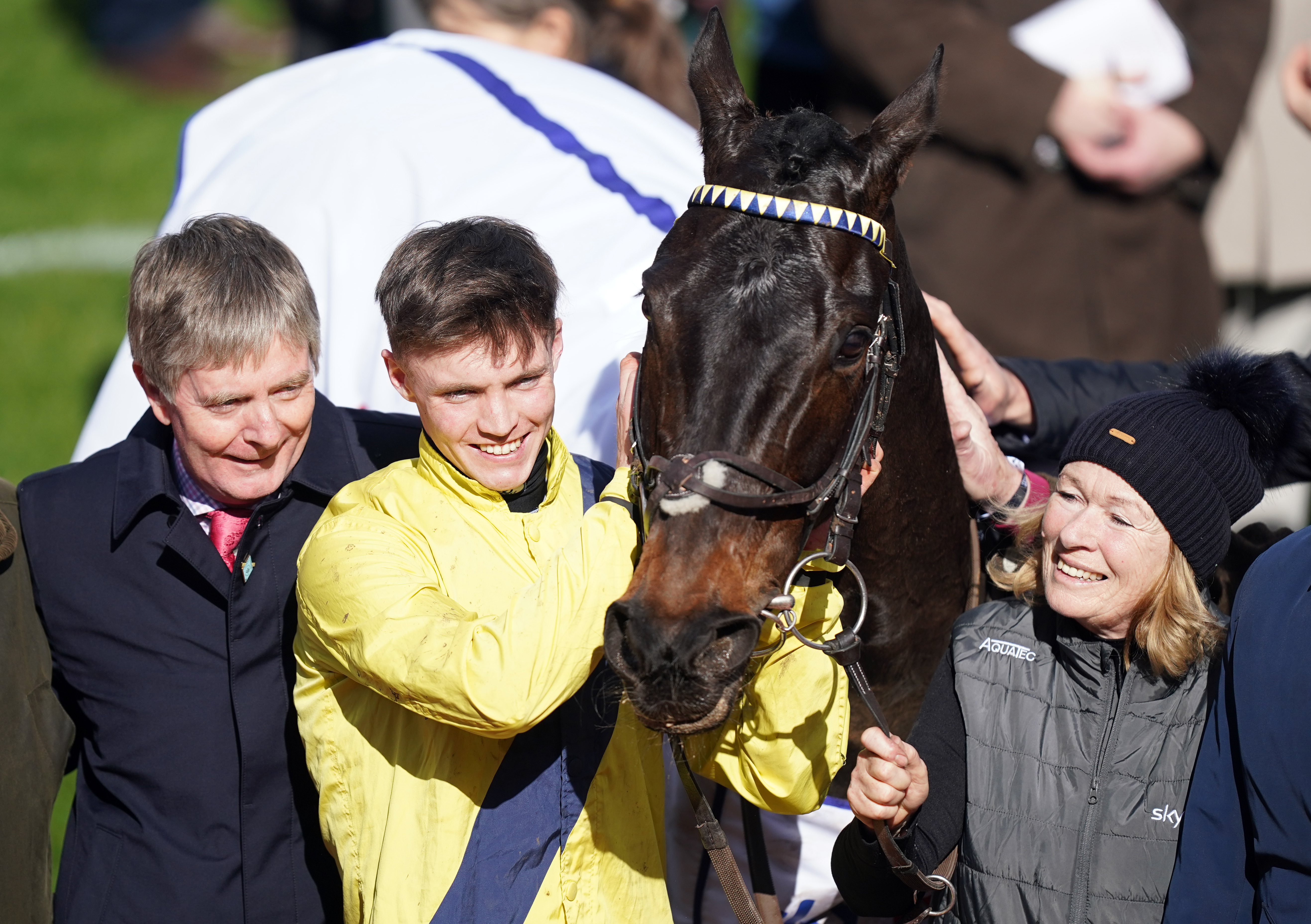 Michael O’Sullivan celebrates winning the Supreme Novices’ Hurdle with Marine Nationale, alongside owner and trainer Barry Connell