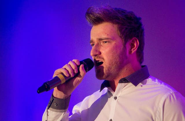 Jai McDowall singing at Help a Capital Child Burns night at the Marriott Grosvenor Square, London