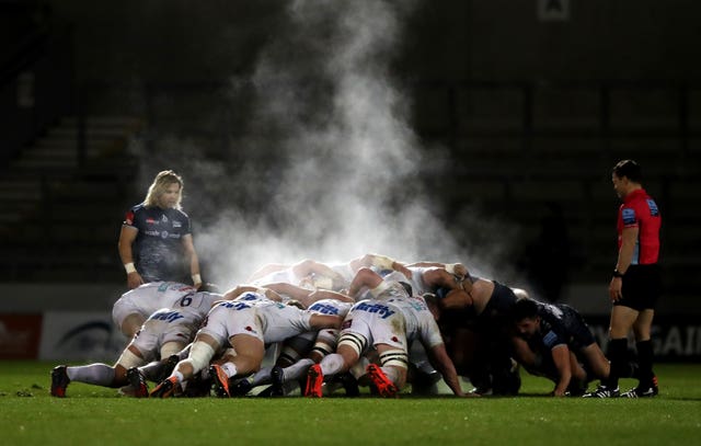 Sale and Exeter players form a scrum