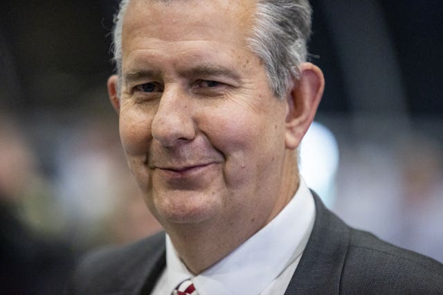 Edwin Poots smiles at the camera