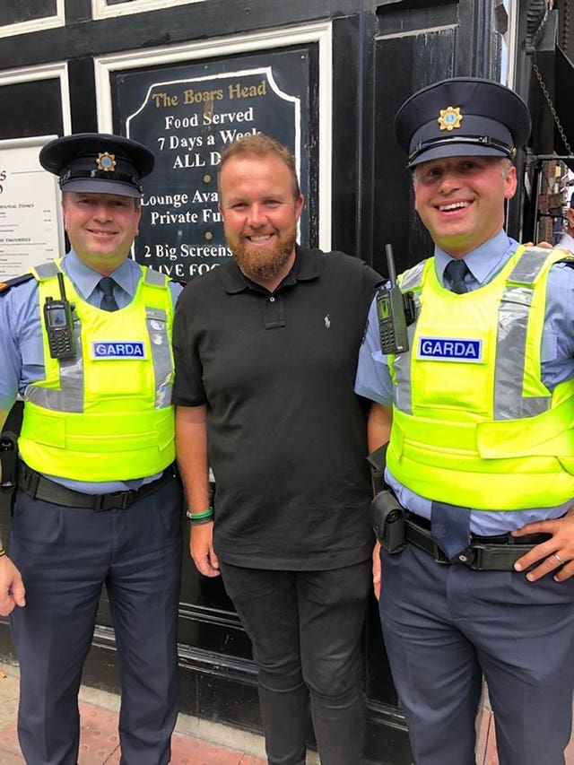 Sgt Gillolley and Insp Cullen meeting Open champion Shane Lowry on Capel Street in Dublin