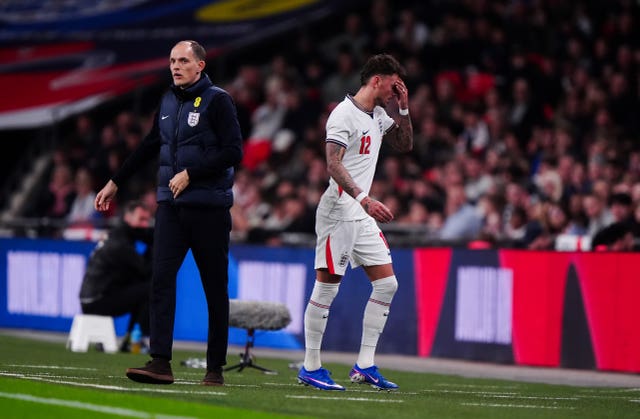 England’s Ben White walks past manager Thomas Tuchel