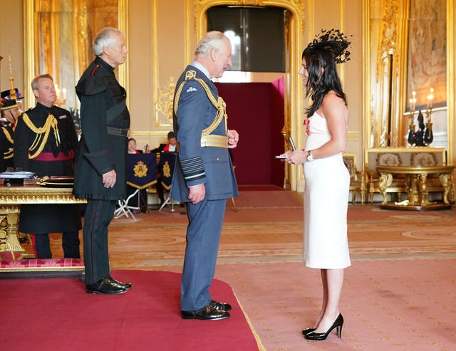 Eve Muirhead is made an MBE (Member of the Order of the British Empire) and an OBE (Officer of the Order of the British Empire) by the Prince of Wales at Windsor Castle