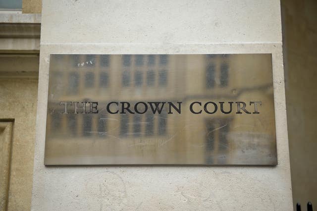 A general view of the mirrored sign outside Bristol Crown Court (Ben Birchall/PA) 