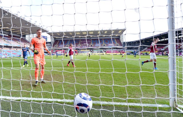 Chris Wood, right, celebrates his unconventional equaliser