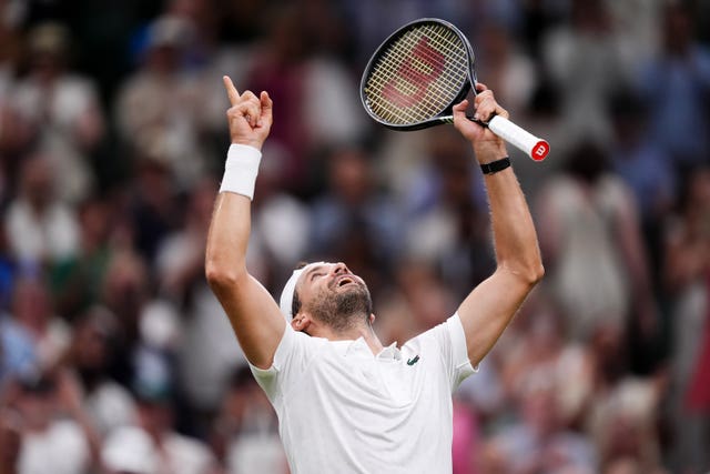Grigor Dimitrov points to the roof after beating Matteo Berrettini 