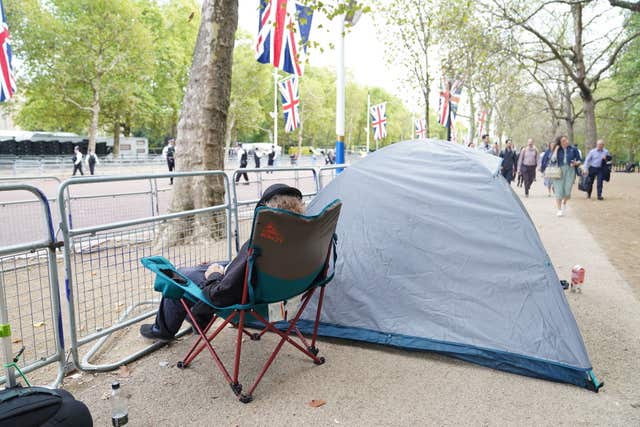 People start to camp on The Mall, London, ahead of the Queen’s coffin being taken from Buckingham Palace on Wednesday afternoon