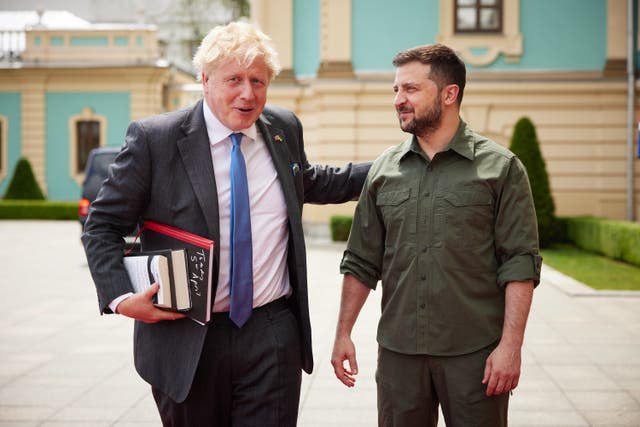President Volodymyr Zelensky (right) greets Boris Johnson in Kyiv 
