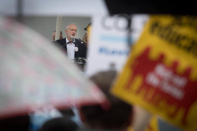 Mr Corbyn addresses college students and teachers during the protest