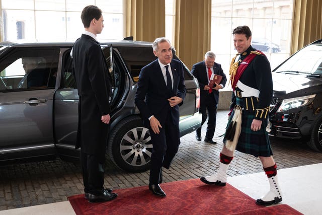 Prime Minister of Canada Mark Carney arrives at the Palace, stepping from his car in the Palace quadrangle 