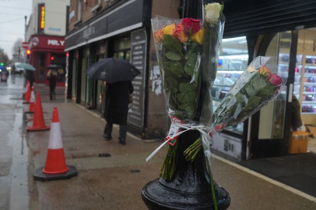 Flowers left at the scene of the collision