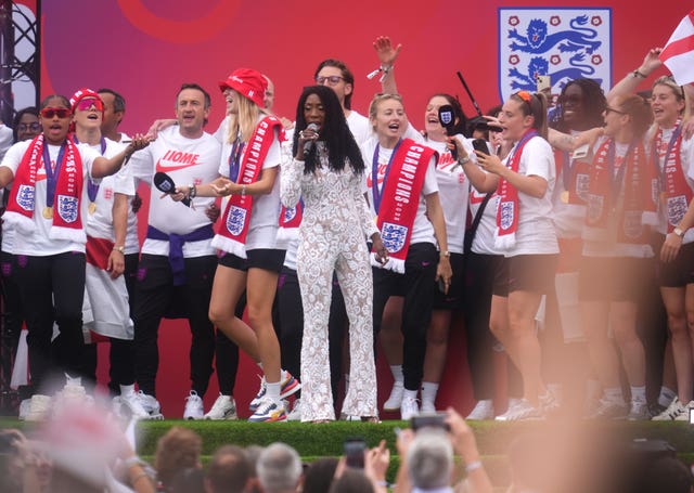 Heather Small performs as England players celebrate on stage