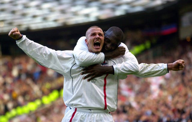 David Beckham celebrates his dramatic late goal against Greece in 2001