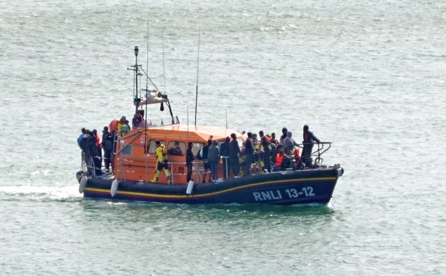 A group of people thought to be migrants are brought in to Dover onboard an RNLI lifeboat 