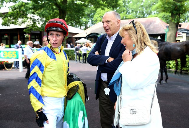 Jockey Sam James speaks to Poptronic's owners David and Yvonne Blunt