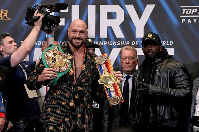 Dillian Whyte, right, will attempt to dethrone Tyson Fury as WBA heavyweight champion this weekend (Nick Potts/PA)