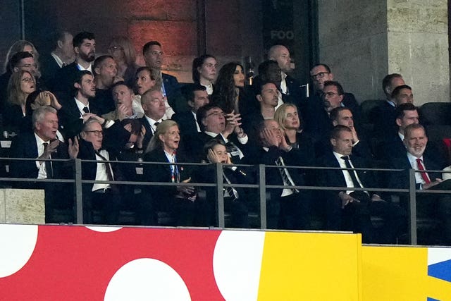 Prime Minister Sir Keir Starmer, Prince George and Prince of Wales hold their hands to their head during the match