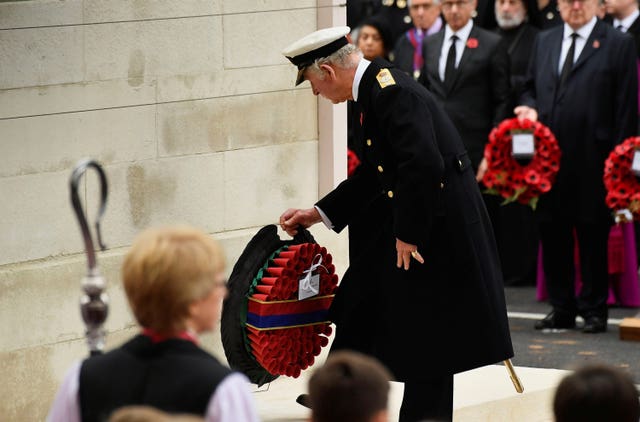 The Prince of Wales lays a wreath 