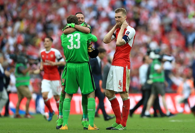 Cech and Ospina embrace after Arsenal beat Chelsea to win the FA Cup last season.