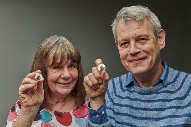 Julia Donaldson and Axel Scheffer with the 50p Gruffalo coins