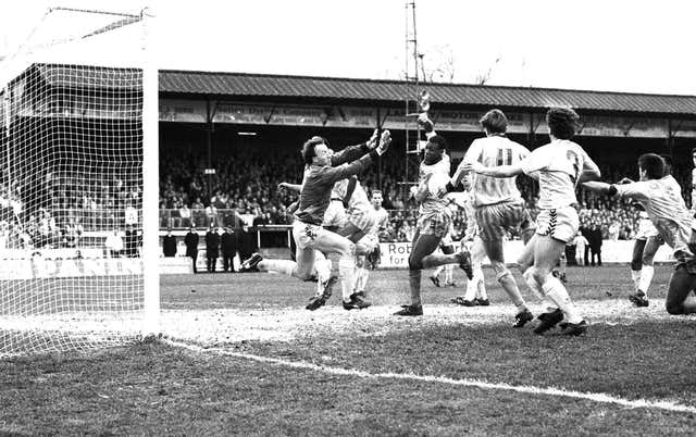 Matthew Hanlan scores for Sutton in a famous FA Cup upset over Coventry.