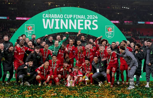 Liverpool's players celebrate winning the Carabao Cup