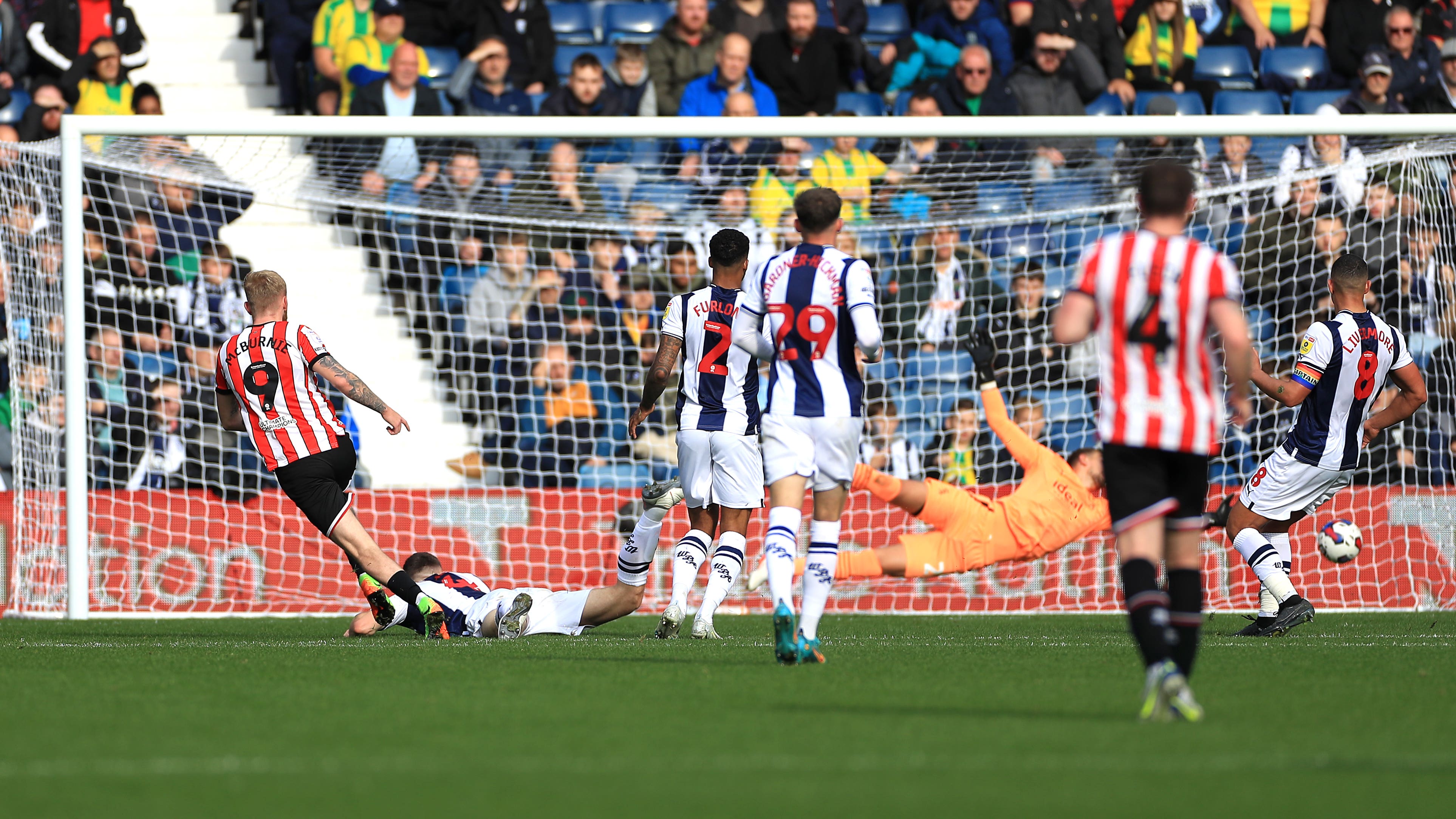 Oli McBurnie (left) scores for Sheffield United (Bradley Collyer/PA)
