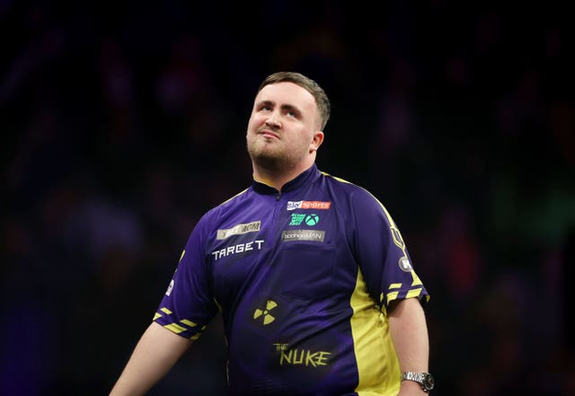 Luke Littler reacts during his match against Michael van Gerwen on night one of the 2025 Premier League at the SSE Arena in Belfast