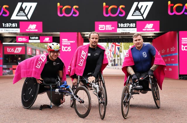 Switzerland’s Marcel Hug (centre) won the men’s elite wheelchair race in 2022