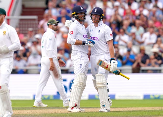 Ben Foakes (left) celebrates with team-mate Ben Stokes