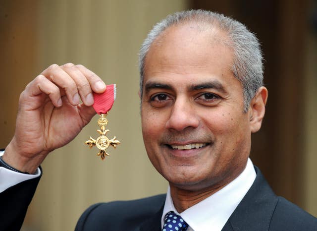 George Alagiah after collecting his OBE