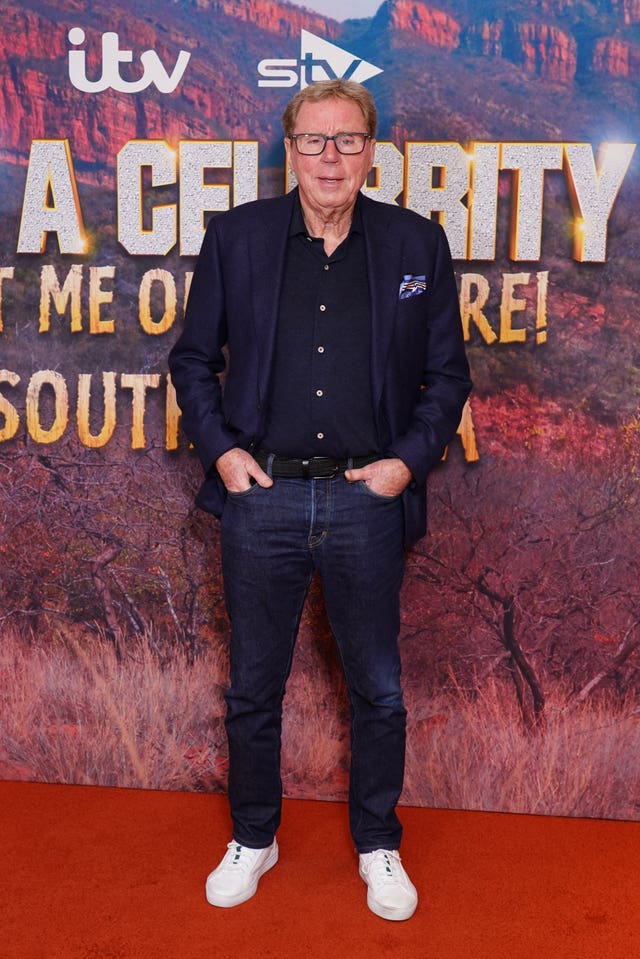 Harry Redknapp in front of an I’m A Celebrity Get Me Out Of Here! - South Africa poster