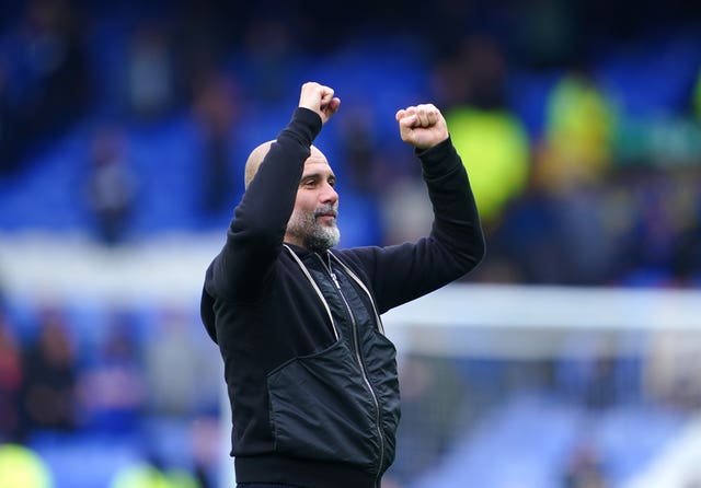 Pep Guardiola reacts after Manchester City's win over Everton