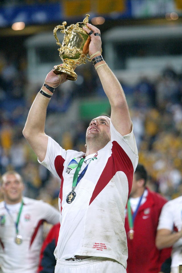 England captain Martin Johnson lifts the Webb Ellis Cup